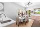 The dining room is bright and features modern cabinets and a view to the outside at 179 Adomeit Dr, Henderson, NV 89074