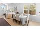 Cozy dining area with modern decor and natural light, perfect for Gathering meals at 179 Adomeit Dr, Henderson, NV 89074