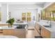Elegant kitchen features modern appliances, white countertops, and a sunny breakfast nook at 179 Adomeit Dr, Henderson, NV 89074