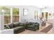 Inviting living area with neutral walls, comfortable sofas, and views into the dining and kitchen spaces at 179 Adomeit Dr, Henderson, NV 89074