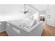 Open loft area overlooking the living room features lots of natural light and a ceiling fan at 179 Adomeit Dr, Henderson, NV 89074