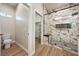 Bathroom view featuring marble tiled walk in shower and walk in closet at 1800 Huckleberry St, Pahrump, NV 89048