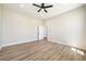 Bedroom features a ceiling fan and has a doorway to the other rooms of the house at 1800 Huckleberry St, Pahrump, NV 89048
