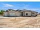 Charming single-story home featuring a three car garage and neutral color palette at 1800 Huckleberry St, Pahrump, NV 89048