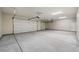 Spacious three car garage with ample room for vehicles and storage at 1800 Huckleberry St, Pahrump, NV 89048