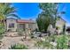Beautiful single-story home with drought-resistant landscaping in the front yard at 2402 Saguaro Point St, Las Vegas, NV 89115