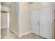 Hallway showing tile flooring leading to the front doors and the interior of the house at 2402 Saguaro Point St, Las Vegas, NV 89115