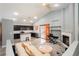 Inviting open concept living space that connects the kitchen and living room for seamless entertaining at 2421 Sunrise Springs Ct, North Las Vegas, NV 89031