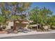 Charming single-story home with a two-car garage and mature trees in a well-maintained community at 2541 Desert Glen Dr, Las Vegas, NV 89134