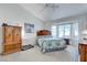 Bedroom featuring a large bay window, vaulted ceiling and striped carpet at 2541 Desert Glen Dr, Las Vegas, NV 89134