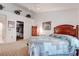 Bedroom featuring a large bed, walk-in closet, and vaulted ceiling at 2541 Desert Glen Dr, Las Vegas, NV 89134