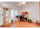 Bright office featuring laminate flooring, a desk, and natural light from the backyard at 2541 Desert Glen Dr, Las Vegas, NV 89134
