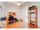 The office features a ceiling fan and wood laminate flooring at 2541 Desert Glen Dr, Las Vegas, NV 89134
