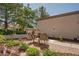 A cozy front patio with a table and chairs, perfect for relaxing and enjoying the outdoors at 2541 Desert Glen Dr, Las Vegas, NV 89134