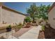 A cozy front patio with a table and chairs, perfect for relaxing and enjoying the outdoors at 2541 Desert Glen Dr, Las Vegas, NV 89134