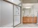 Bathroom with a spacious shower and a double sink vanity with granite counters at 2555 Hampton Rd # 5104, Henderson, NV 89052