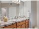 Bathroom vanity with double sinks, granite countertops, and ample storage space at 2555 Hampton Rd # 5104, Henderson, NV 89052