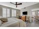 Bright bedroom with plantation shutters offers views of the living room at 2555 Hampton Rd # 5104, Henderson, NV 89052
