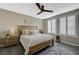 Beautifully styled bedroom with wood-look floors, neutral walls, and bright natural light at 2555 Hampton Rd # 5104, Henderson, NV 89052