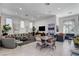 The clubhouse has comfortable seating areas, stylish decor, a dining table, and a large TV at 2555 Hampton Rd # 5104, Henderson, NV 89052