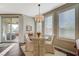 Cozy dining room with a sliding glass door for balcony access and plenty of natural light at 2555 Hampton Rd # 5104, Henderson, NV 89052