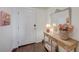 Inviting entryway with charming decor, wood floors, and a white door, creating a warm welcome at 2555 Hampton Rd # 5104, Henderson, NV 89052