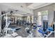 A well-equipped gym with treadmills, weight machines, and large windows for natural light at 2555 Hampton Rd # 5104, Henderson, NV 89052
