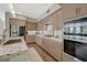 Gourmet kitchen featuring stainless steel appliances and light wood cabinets at 2555 Hampton Rd # 5104, Henderson, NV 89052