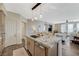 Kitchen island with granite counters, eat-in seating, and stainless appliances at 2555 Hampton Rd # 5104, Henderson, NV 89052