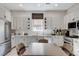 A charming kitchen offers stainless steel appliances and white cabinetry at 2555 Hampton Rd # 5104, Henderson, NV 89052