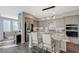 Spacious kitchen features a large island with seating, stainless appliances, and lots of natural light at 2555 Hampton Rd # 5104, Henderson, NV 89052