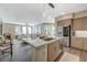 Spacious kitchen island with granite countertops open to the living area at 2555 Hampton Rd # 5104, Henderson, NV 89052