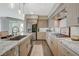 Well-lit kitchen with granite countertops, stainless steel appliances, and neutral cabinetry at 2555 Hampton Rd # 5104, Henderson, NV 89052