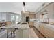 Bright kitchen with granite countertops, stainless steel appliances, and wood-look flooring at 2555 Hampton Rd # 5104, Henderson, NV 89052