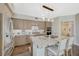 Modern kitchen with granite countertops, stainless appliances, and island seating at 2555 Hampton Rd # 5104, Henderson, NV 89052