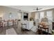 Comfortable living room with dark floors, neutral walls, fireplace and lots of natural light at 2555 Hampton Rd # 5104, Henderson, NV 89052