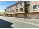 Apartment building exterior showcasing garages, windows, and clean facade at 2786 Fountain Ridge Ln, Henderson, NV 89074