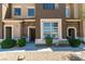 Attractive two-story townhouse featuring stone accents and a well-maintained front yard at 2786 Fountain Ridge Ln, Henderson, NV 89074