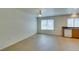 Open kitchen with tile floors, updated appliances, and plenty of natural light, creating an inviting space at 2786 Fountain Ridge Ln, Henderson, NV 89074