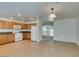Inviting kitchen featuring tile flooring, white appliances, and a convenient layout that connects to the living areas at 2786 Fountain Ridge Ln, Henderson, NV 89074