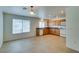 Spacious kitchen boasts tile flooring, abundant cabinetry, and a full suite of appliances for culinary enthusiasts at 2786 Fountain Ridge Ln, Henderson, NV 89074