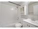 Bright bathroom features a tub and shower combination with white tile and modern fixtures at 2925 Wigwam Pkwy # 1021, Henderson, NV 89074