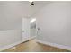 This bedroom offers neutral walls, wood floors and a view of the closet at 2925 Wigwam Pkwy # 1021, Henderson, NV 89074
