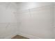 Walk-in closet with white wire shelving offers efficient storage solutions for clothing and accessories at 2925 Wigwam Pkwy # 1021, Henderson, NV 89074
