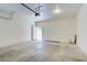 The garage is large with an automatic door and a side door to the backyard at 2925 Wigwam Pkwy # 1021, Henderson, NV 89074