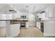 Modern kitchen with granite countertops, white cabinetry, and modern stainless appliances at 2925 Wigwam Pkwy # 1021, Henderson, NV 89074