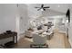 Bright, modern living room with vaulted ceilings, fireplace, and open floor plan into the kitchen at 2925 Wigwam Pkwy # 1021, Henderson, NV 89074