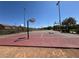 Outdoor basketball court with multiple hoops and well-maintained playing surface at 3165 Beltrada Ave, Henderson, NV 89044