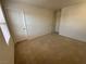 Bedroom with plush carpet and two doors offering accessibility and convenience at 3165 Beltrada Ave, Henderson, NV 89044