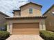 Charming two-story home featuring a two car garage and well-maintained landscaping at 3165 Beltrada Ave, Henderson, NV 89044